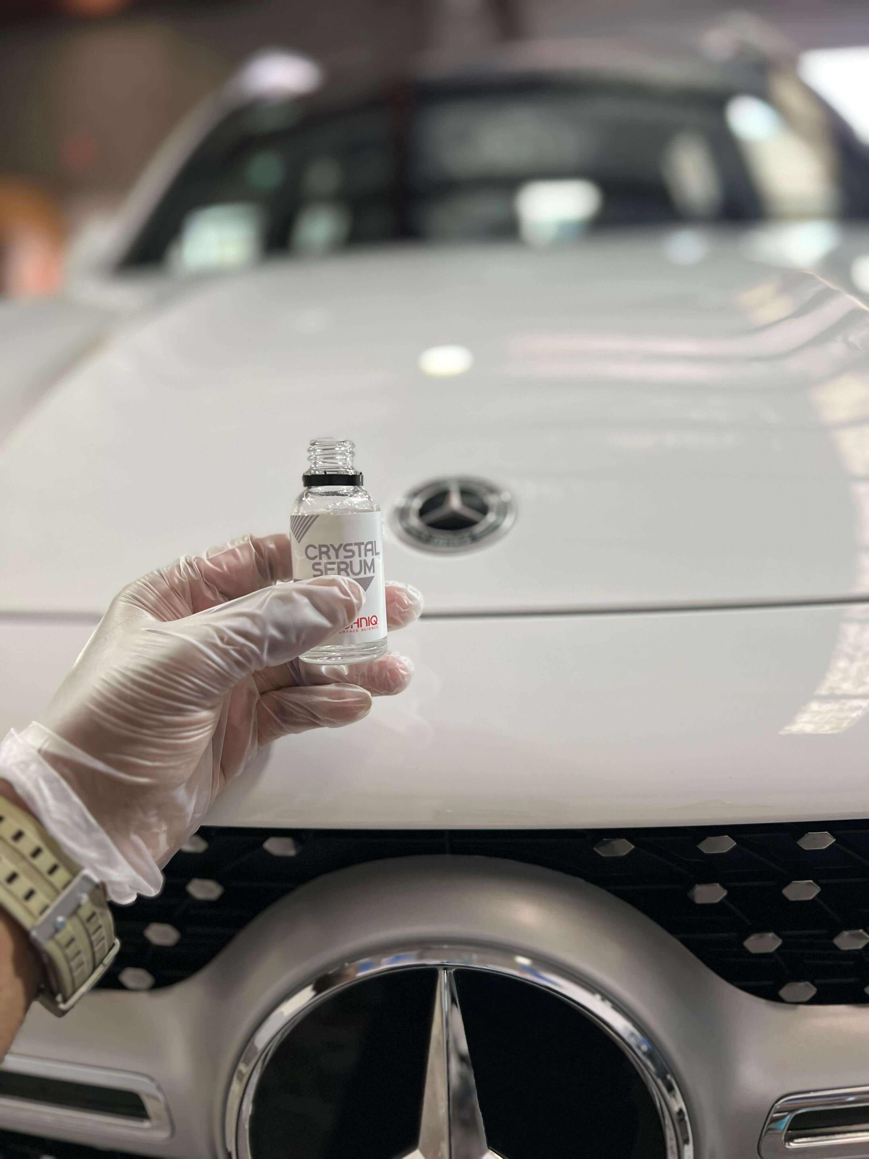 Car with ceramic coating that enhances gloss and repels water, dirt, and UV rays